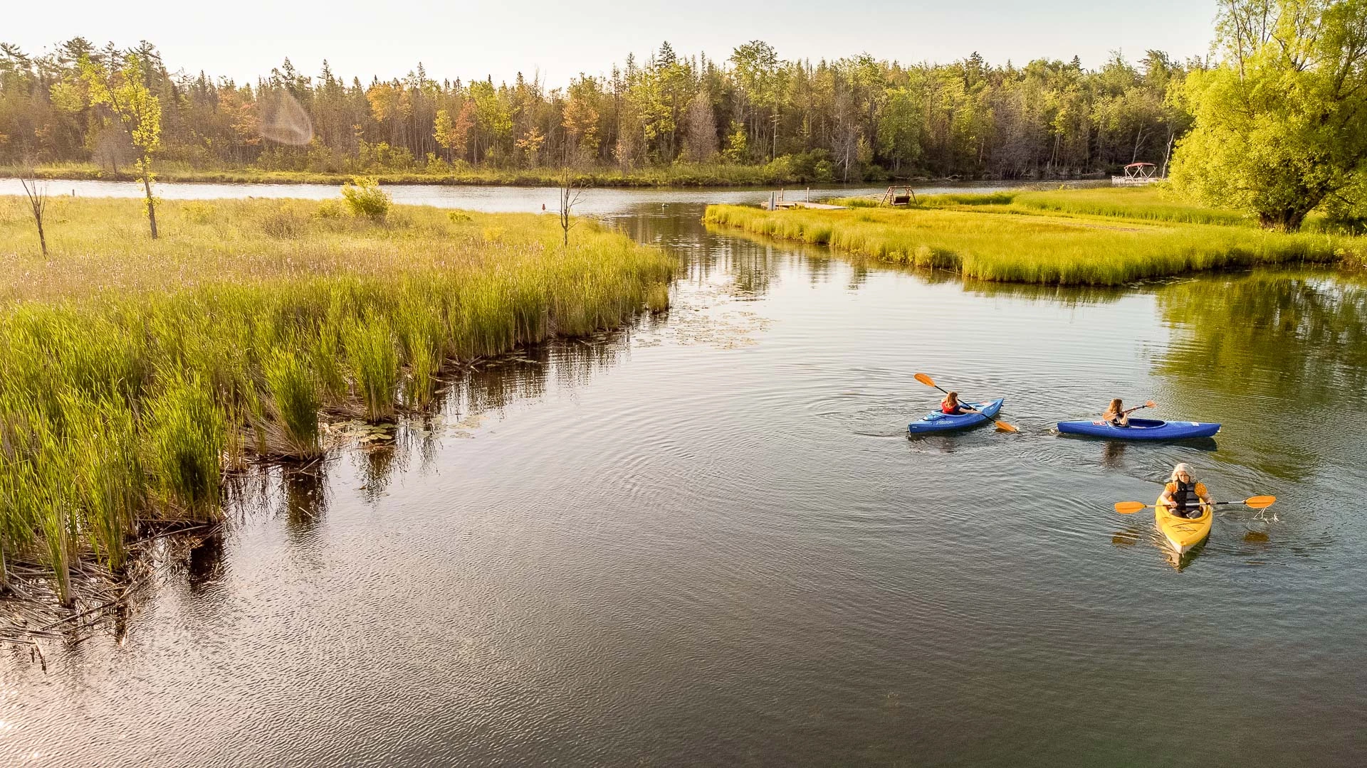 a person in a kayak on a river
