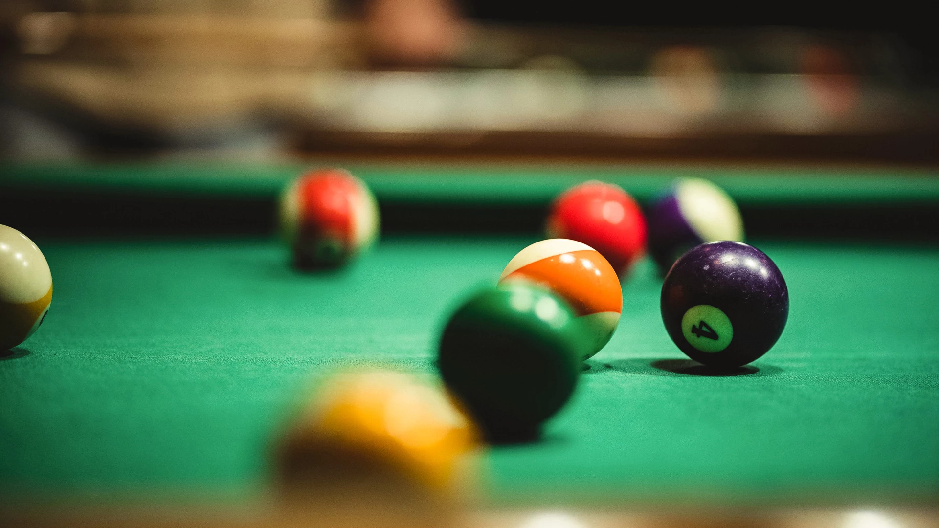 a pool table with balls on it