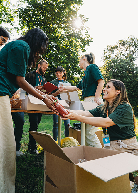 a group of people in green shirts