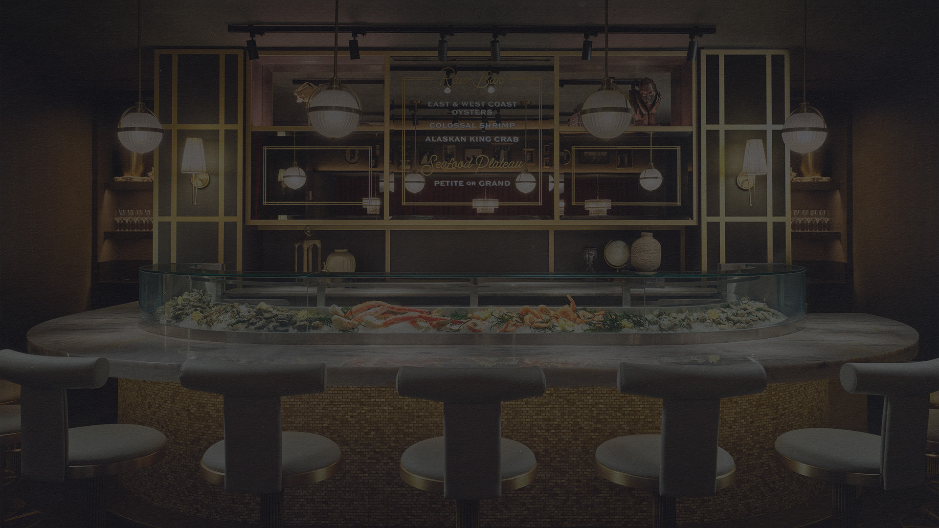 a bar with a counter and chairs