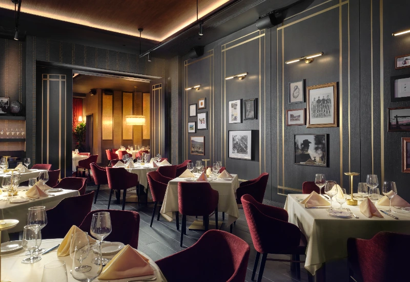 a restaurant with tables and chairs