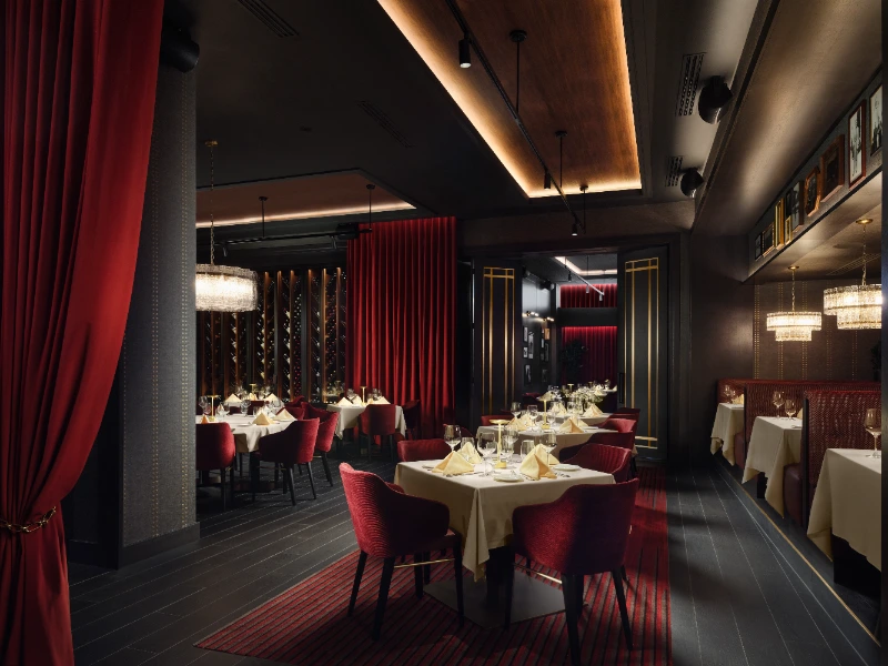 a restaurant with tables and chairs