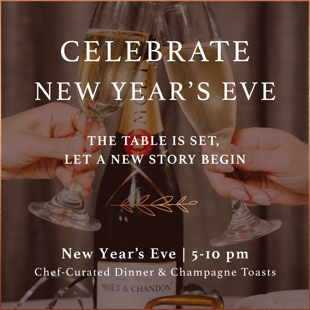 a group of hands holding wine glasses