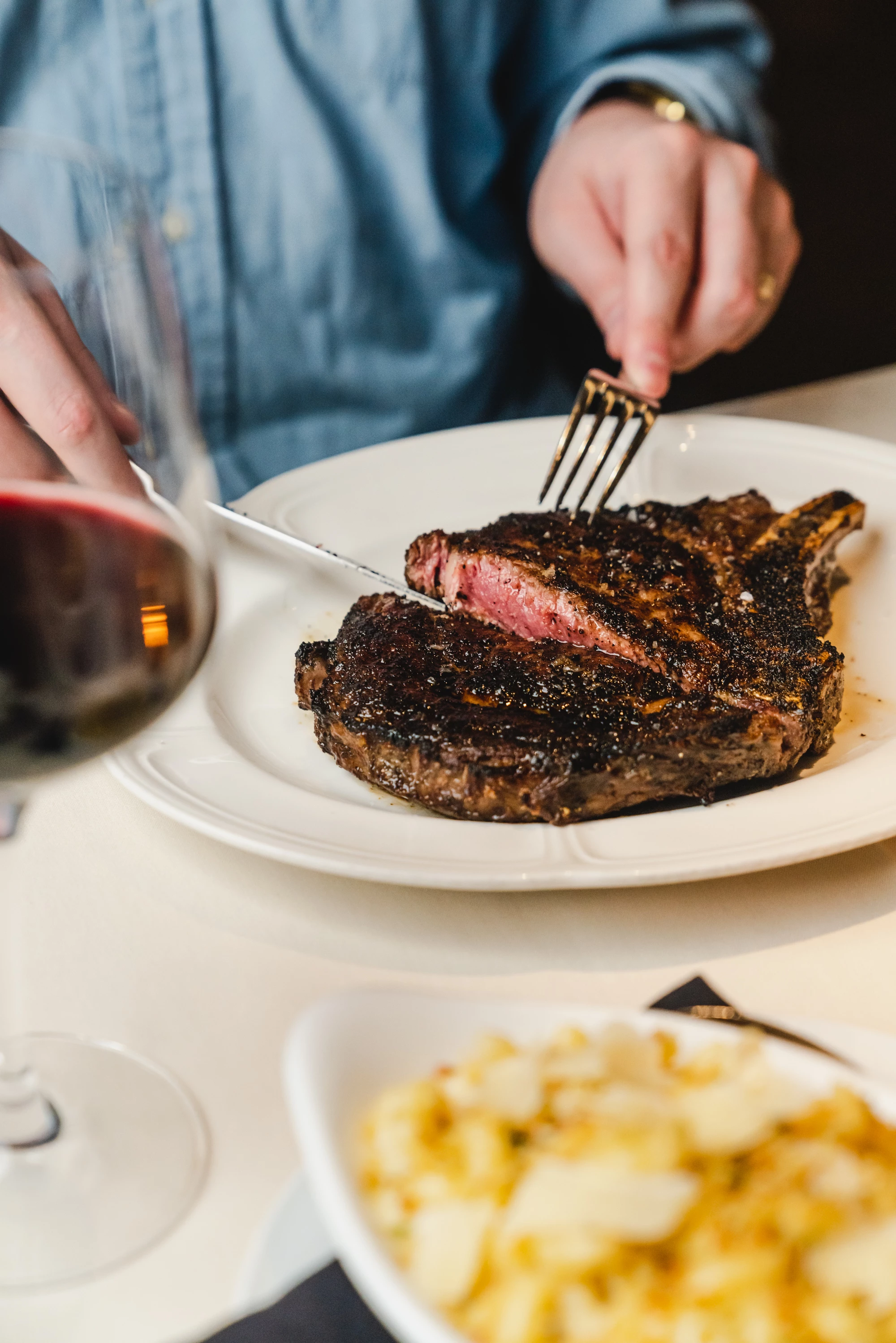 a person eating a steak