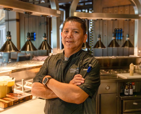 a man standing in a kitchen