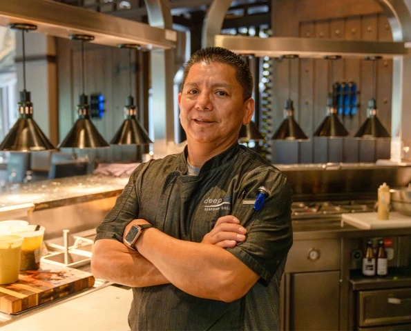 a man standing in a kitchen