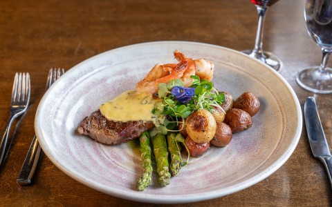 a plate of food with a fork and knife