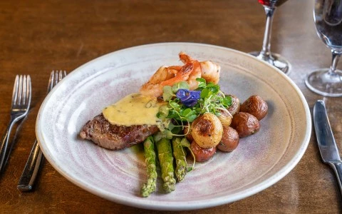 a plate of food with a fork and knife