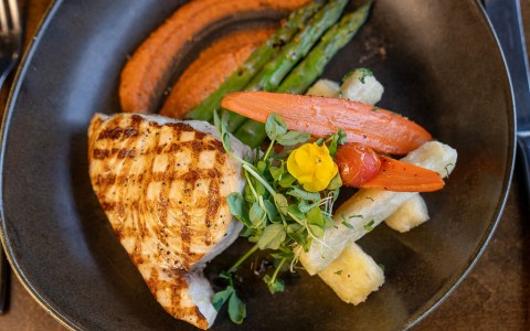 a plate of food with vegetables
