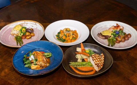 a group of plates of food