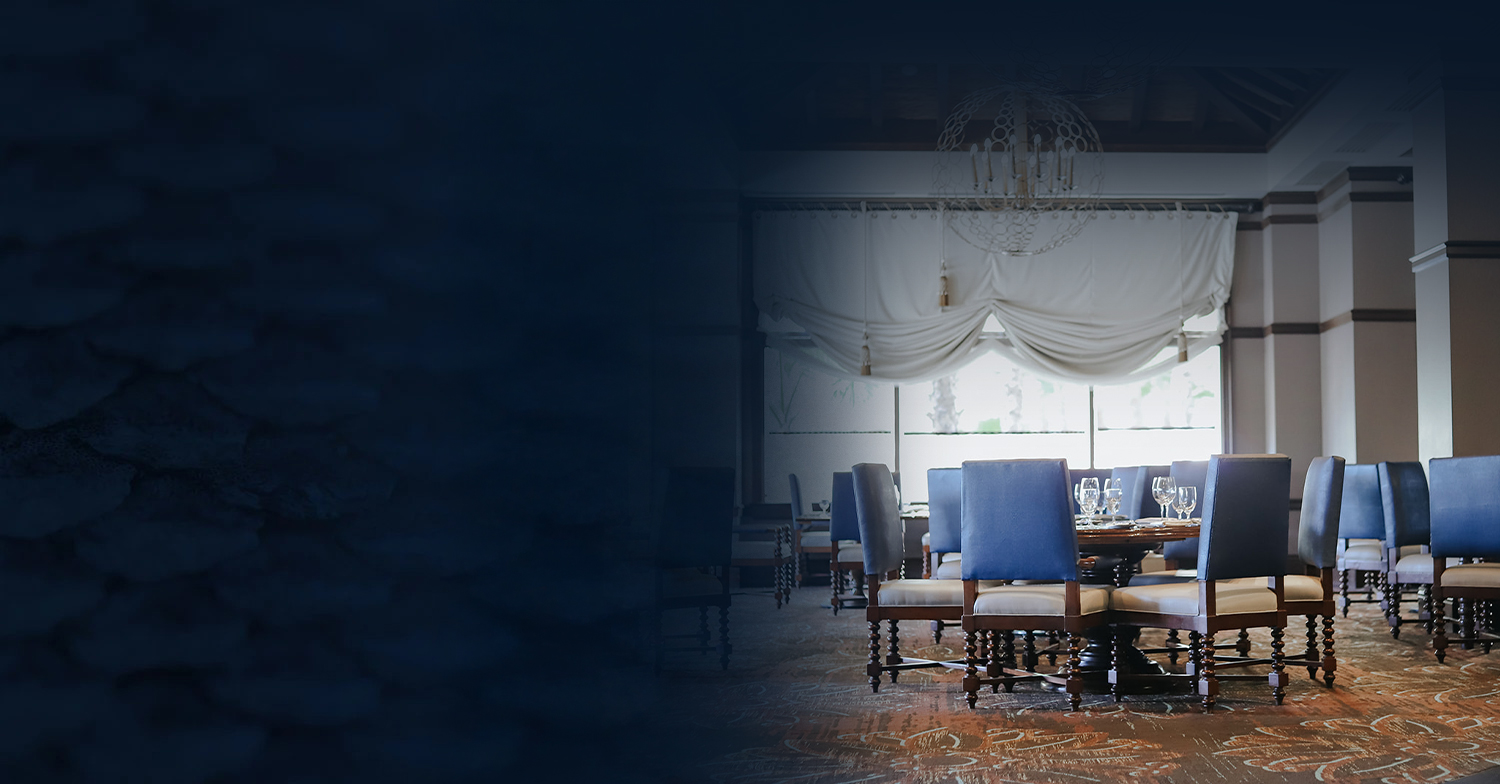 a room with a table and chairs