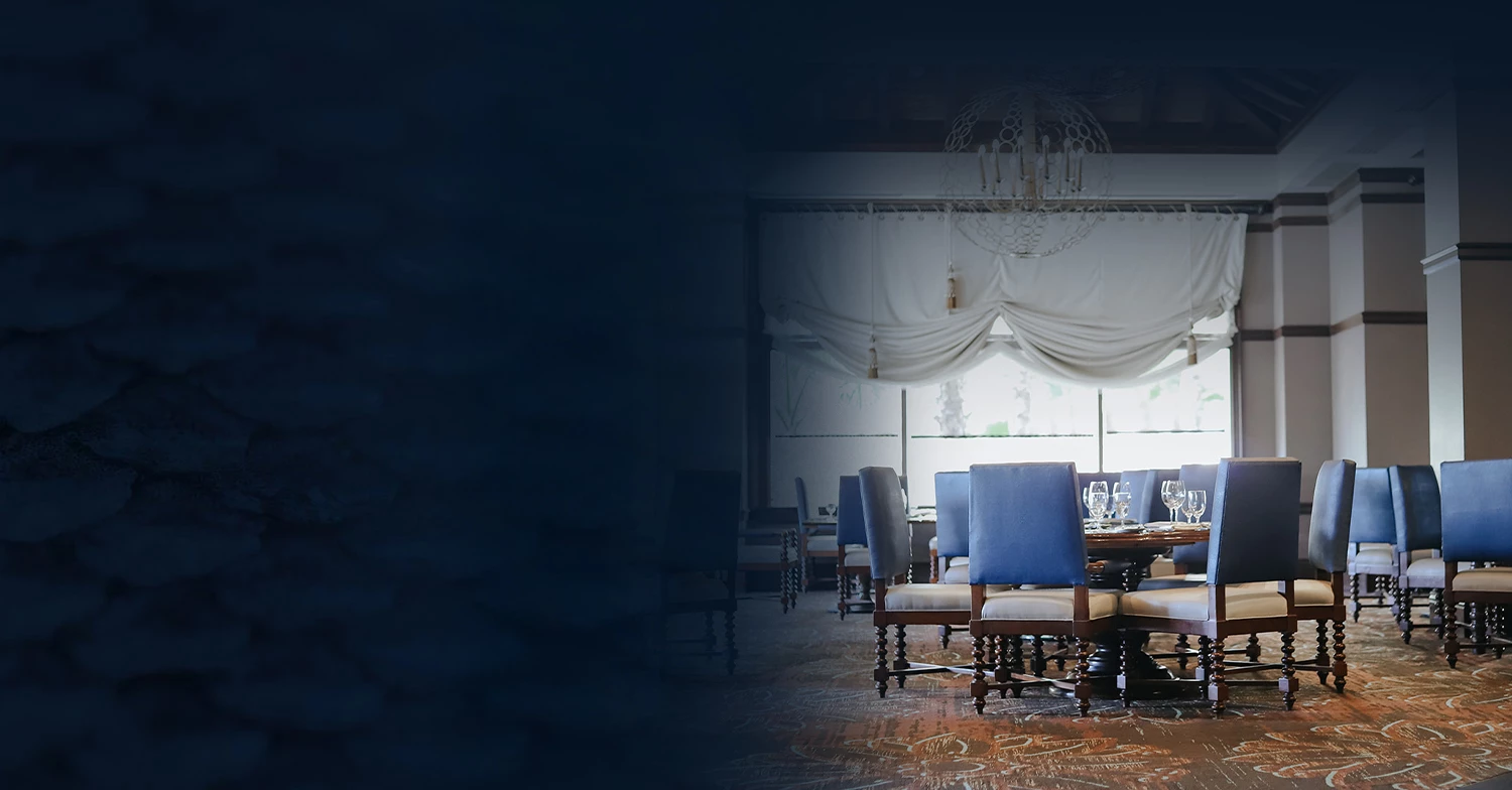 a room with a table and chairs