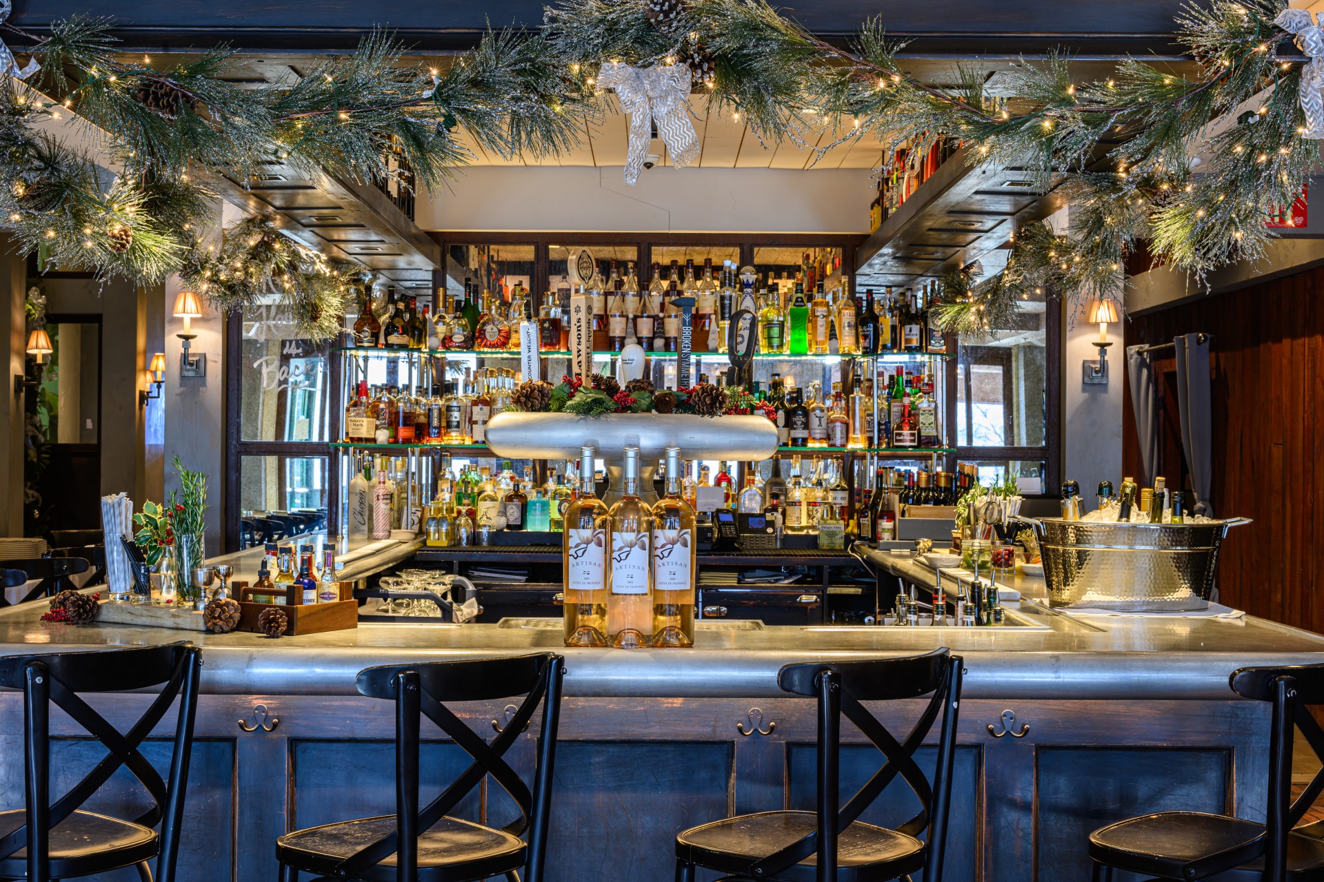 a bar with bottles of alcohol