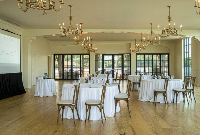 a room with tables and chairs