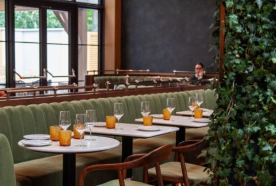 a restaurant with tables and chairs