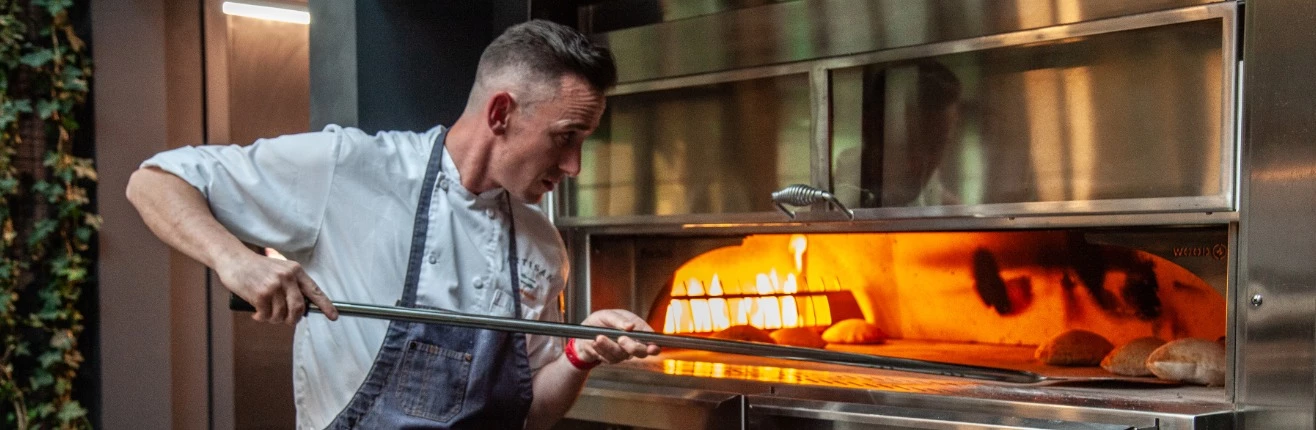 a man in a chef's uniform