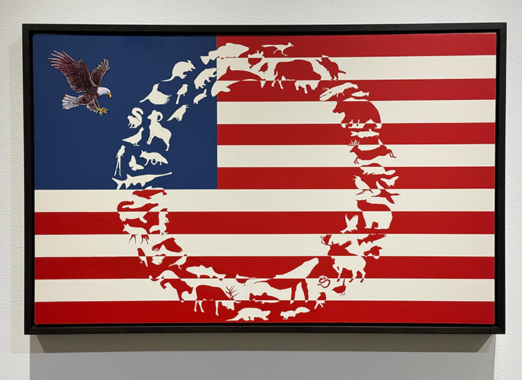 a flag with an eagle and animals in the middle