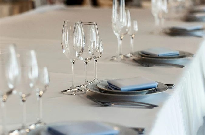 a table with plates and glasses