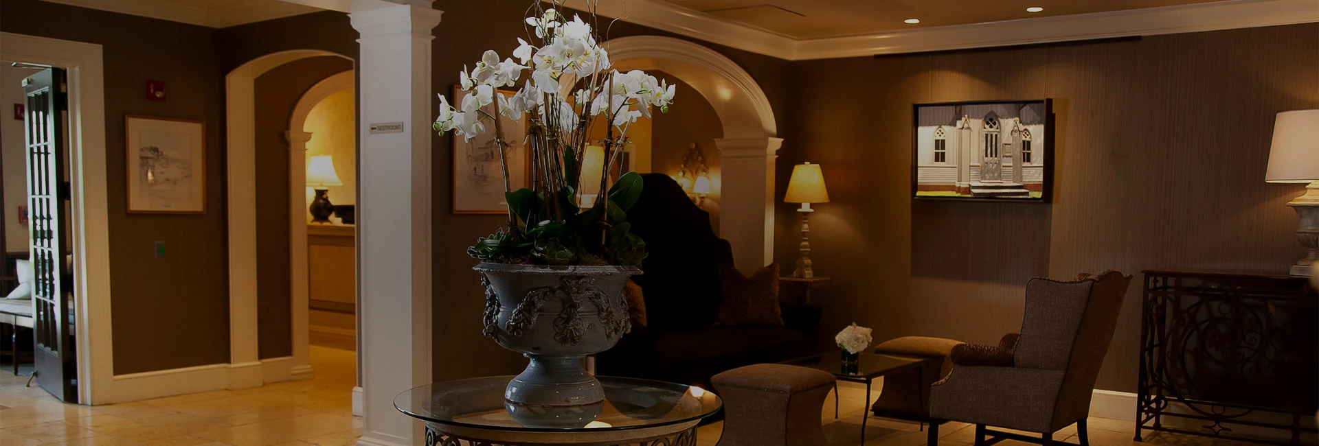 a living room with a large vase