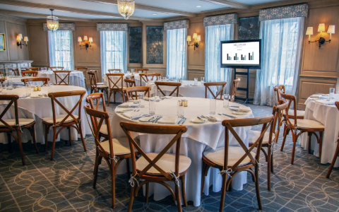 a room with tables and chairs