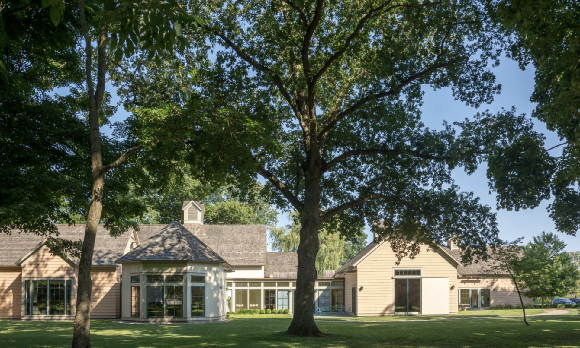 a house with a tree in the back