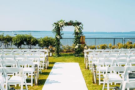 a wedding ceremony west lawn