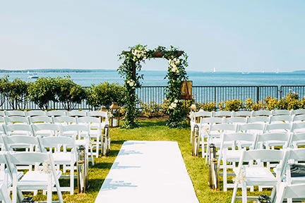 a wedding ceremony west lawn