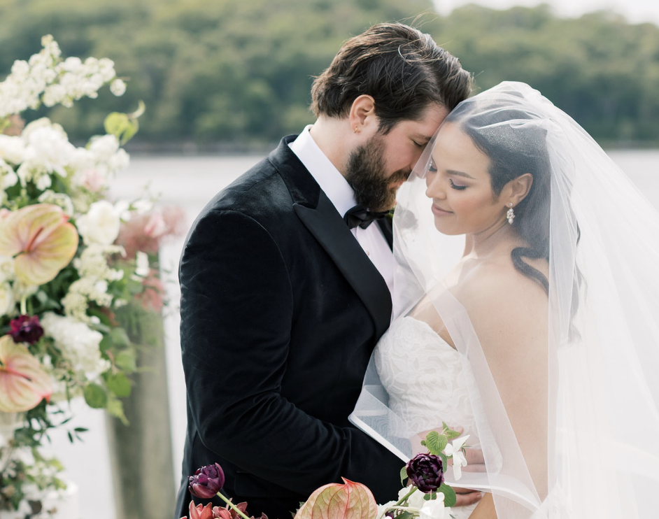 a man and woman in wedding attire