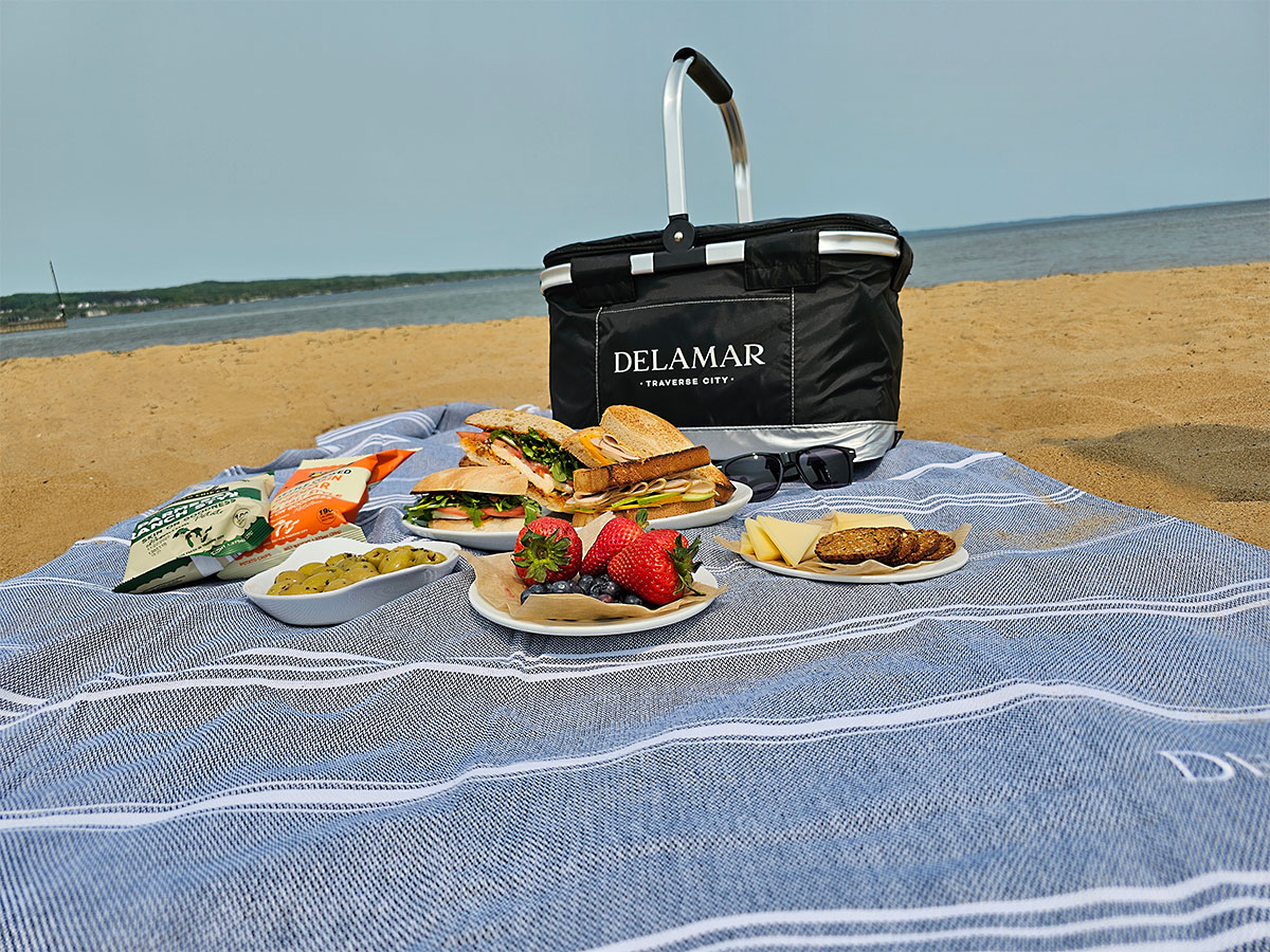 a picnic blanket with food on it