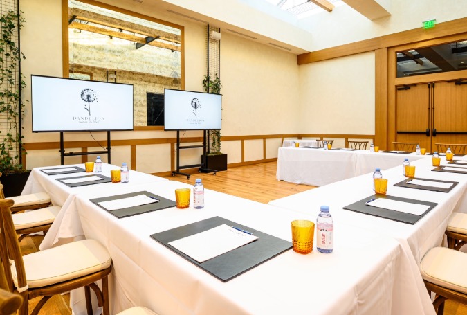 a room with tables and chairs