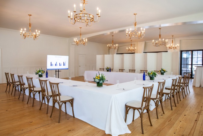 a room with tables and chairs