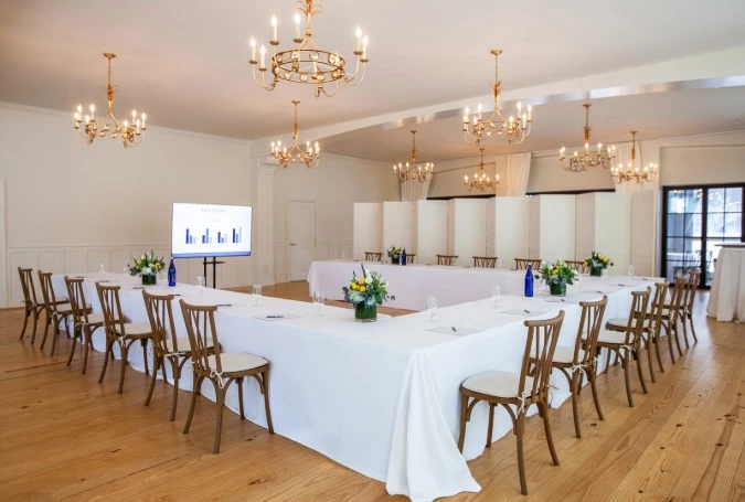 a room with tables and chairs