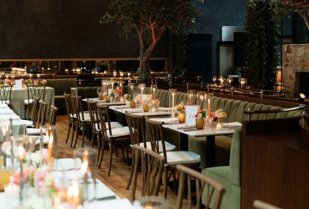 long tables with candles and chairs