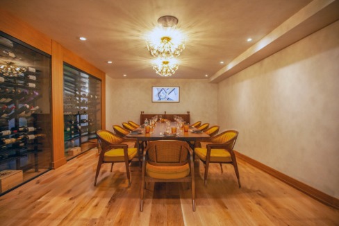 a room with a table and chairs