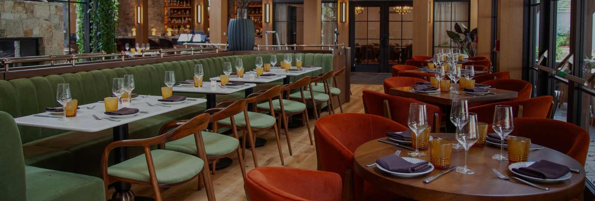 a restaurant with tables and chairs