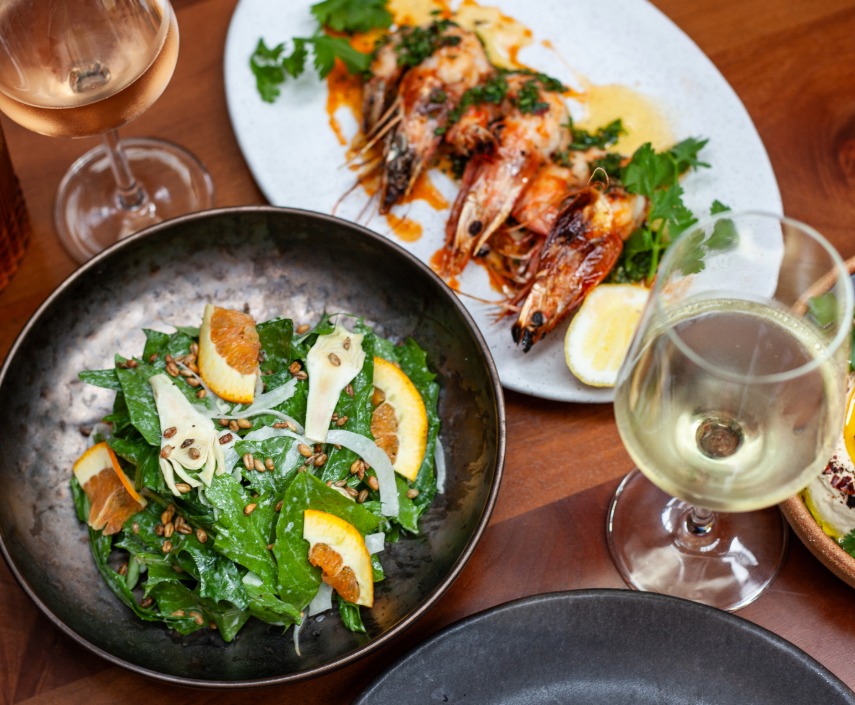 a plate of food and wine