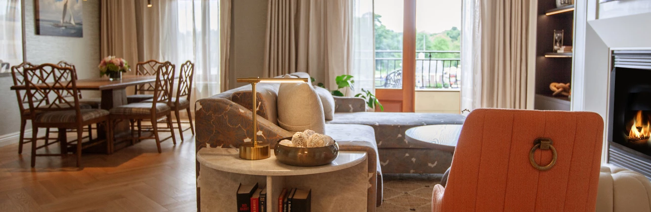a living room with a couch and a table