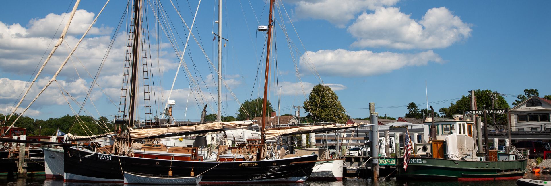 a group of boats in a harbor