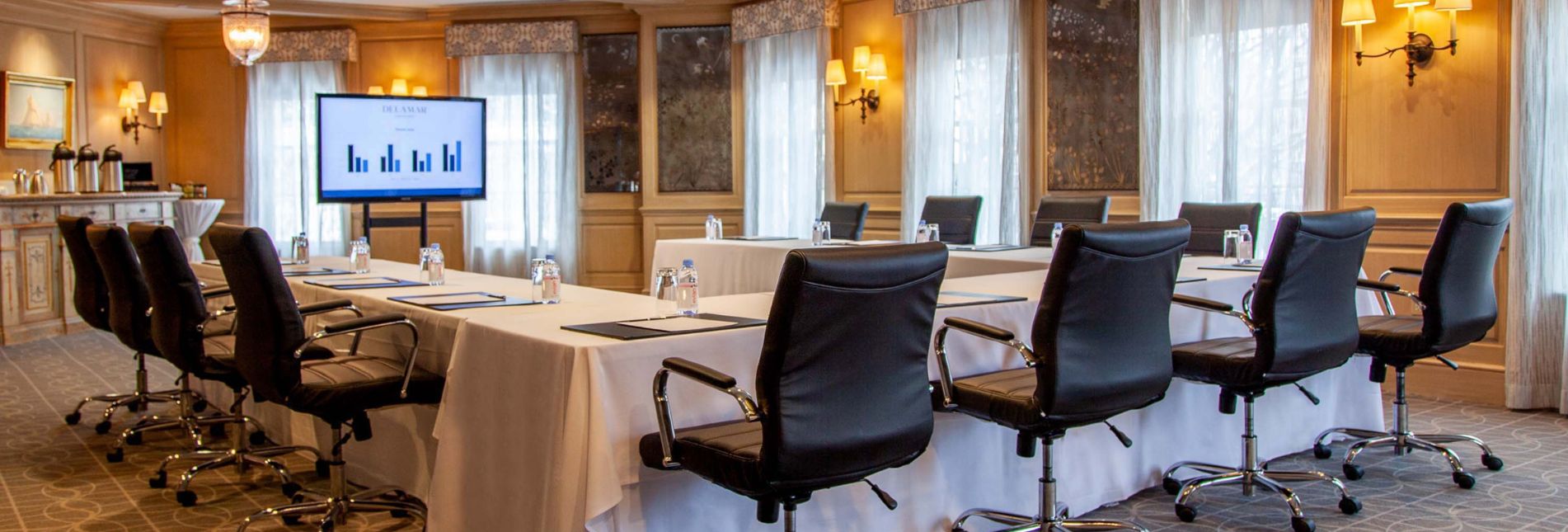 a room with a table and chairs
