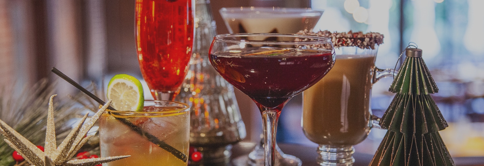 a group of glasses of different drinks
