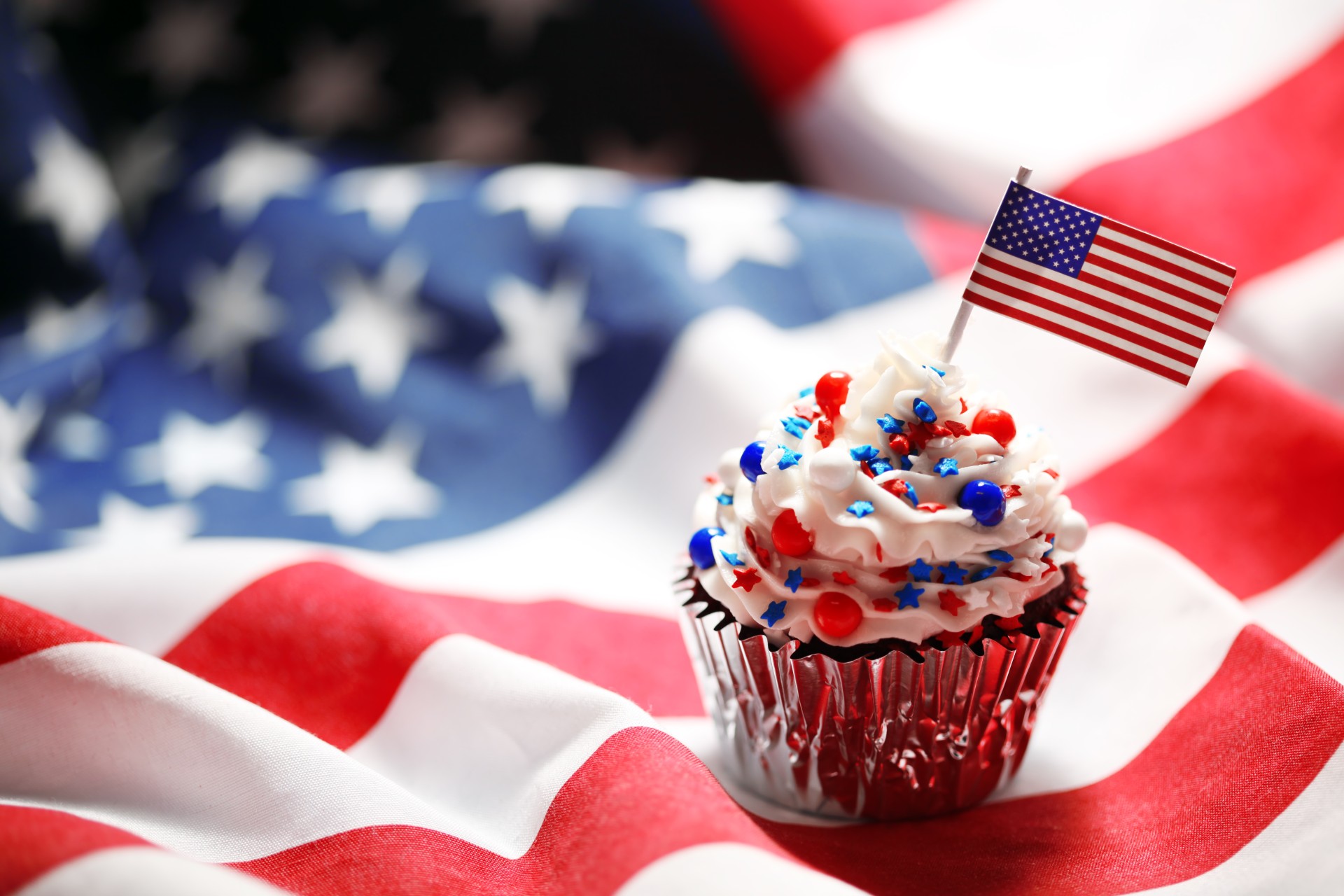 a cupcake with a flag on it