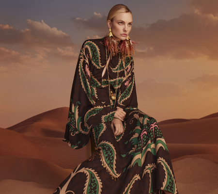 a woman in a long dress