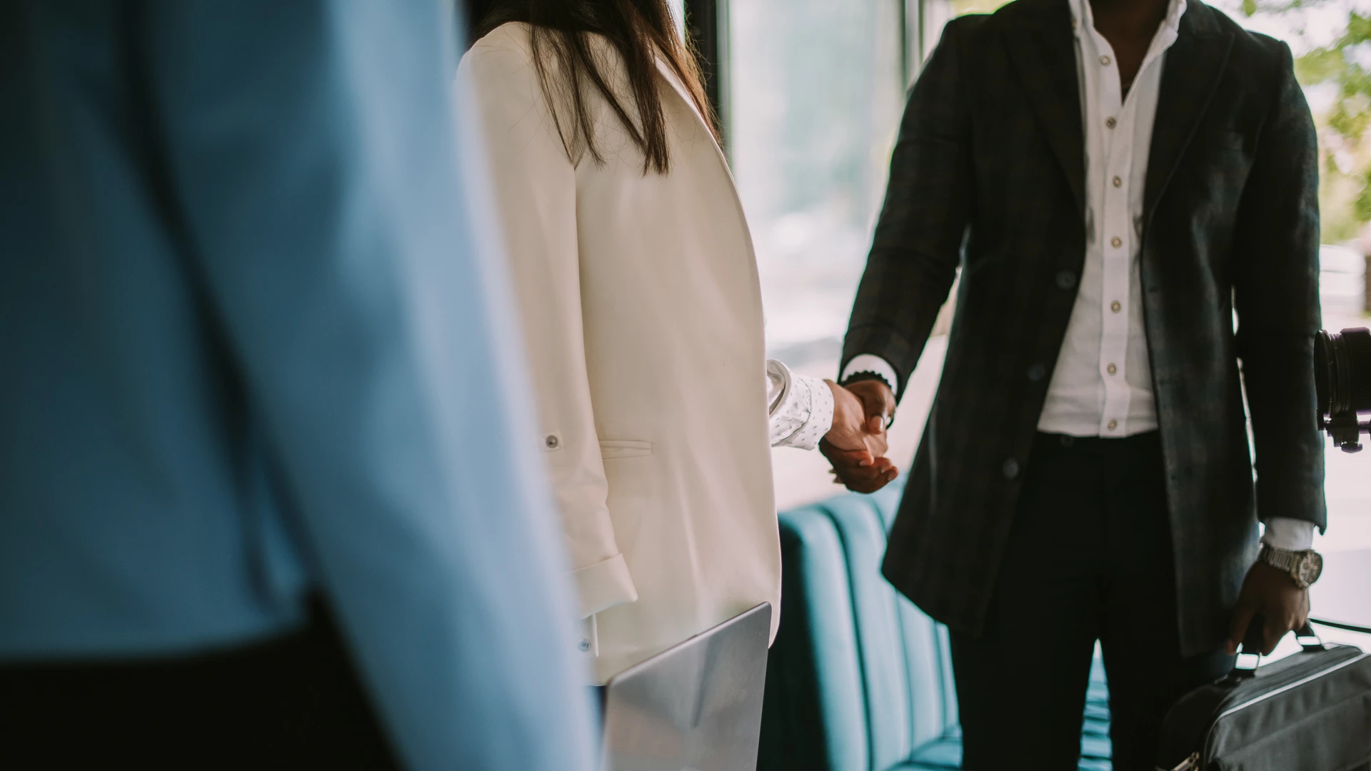 a man and woman shaking hands