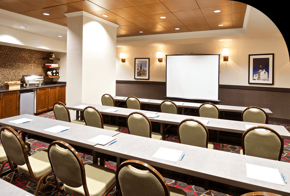 a room with tables and chairs