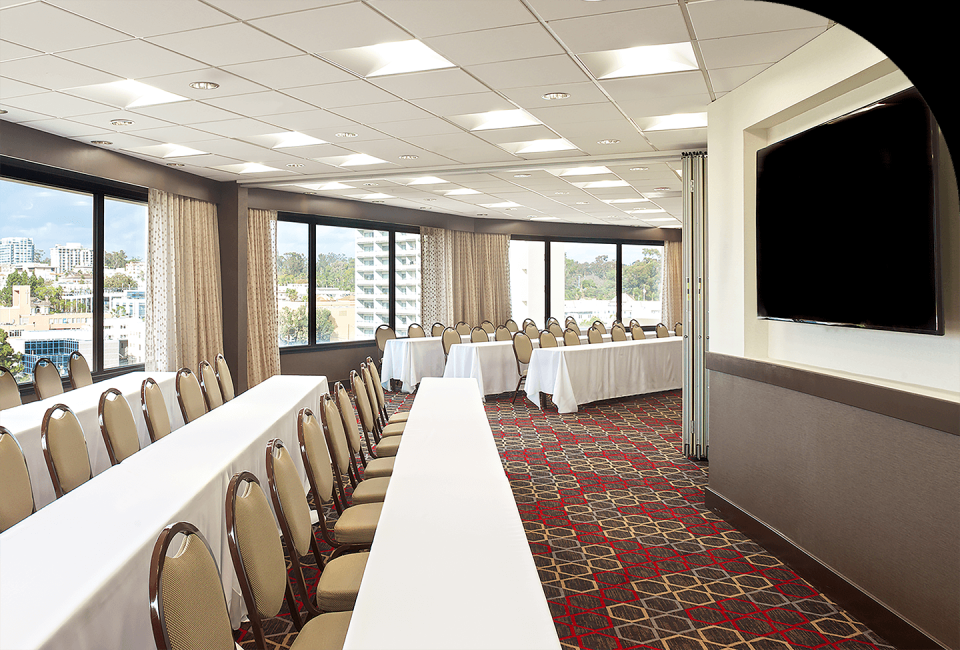 a room with tables and chairs