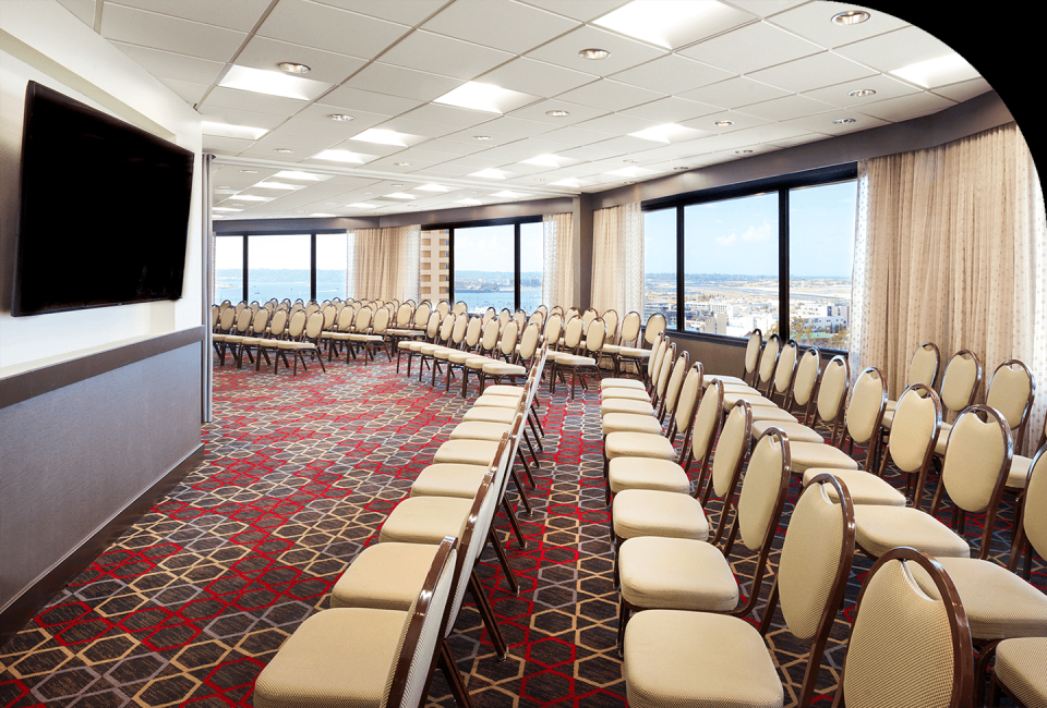 a room with rows of chairs