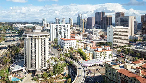 a city with many buildings and a freeway