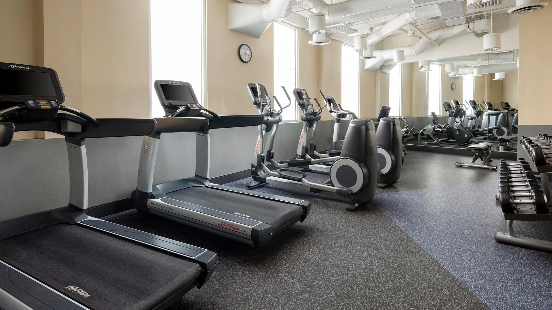 a room with treadmills and treadmills