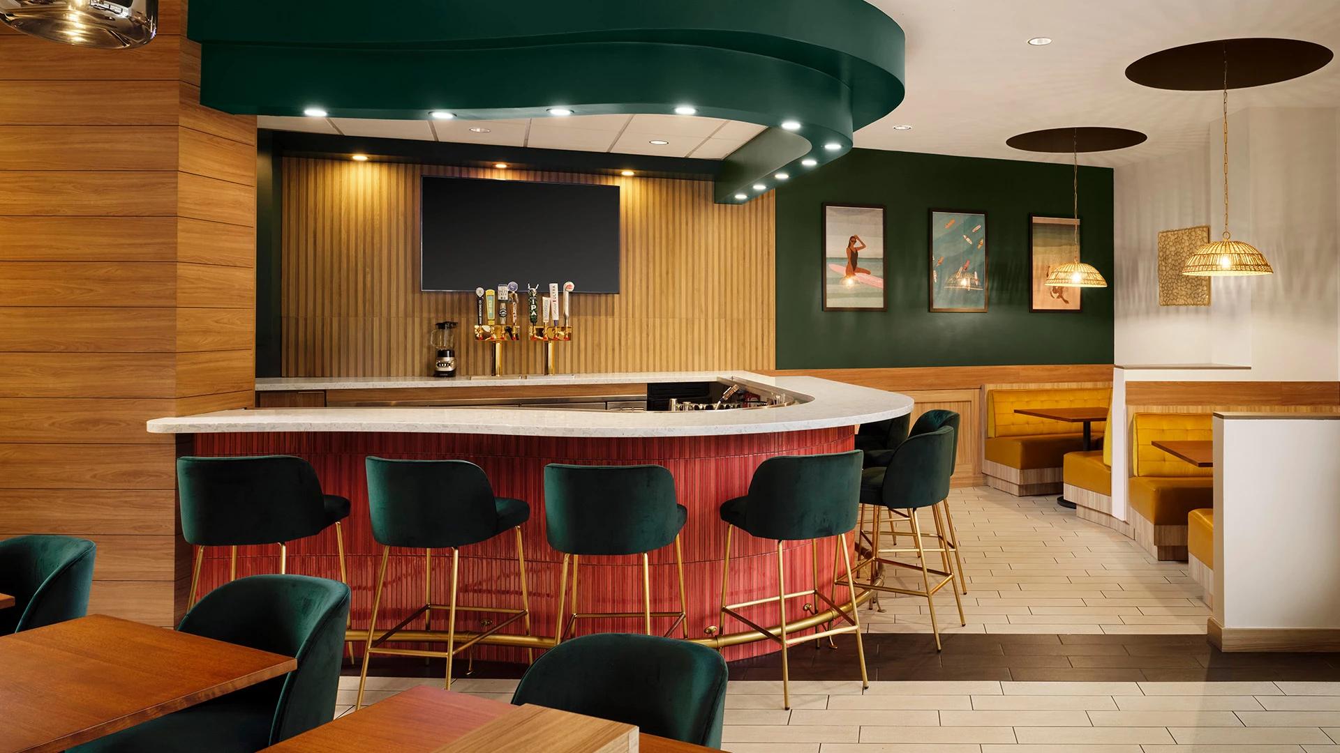 a bar with green chairs and a television