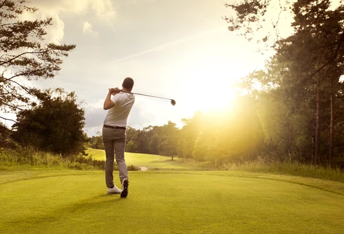 man playing golf